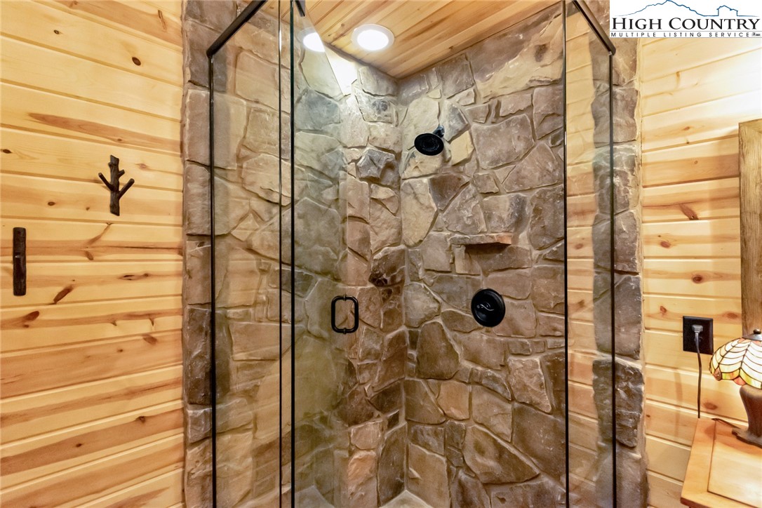4879 Staghorn Road Purlear, NC 28665 - Photo 33 of 50 a bathroom with a shower