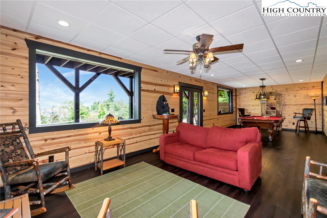 4879 Staghorn Road Purlear, NC 28665 - Photo 41 of 50 a living room with furniture pool table and a large window