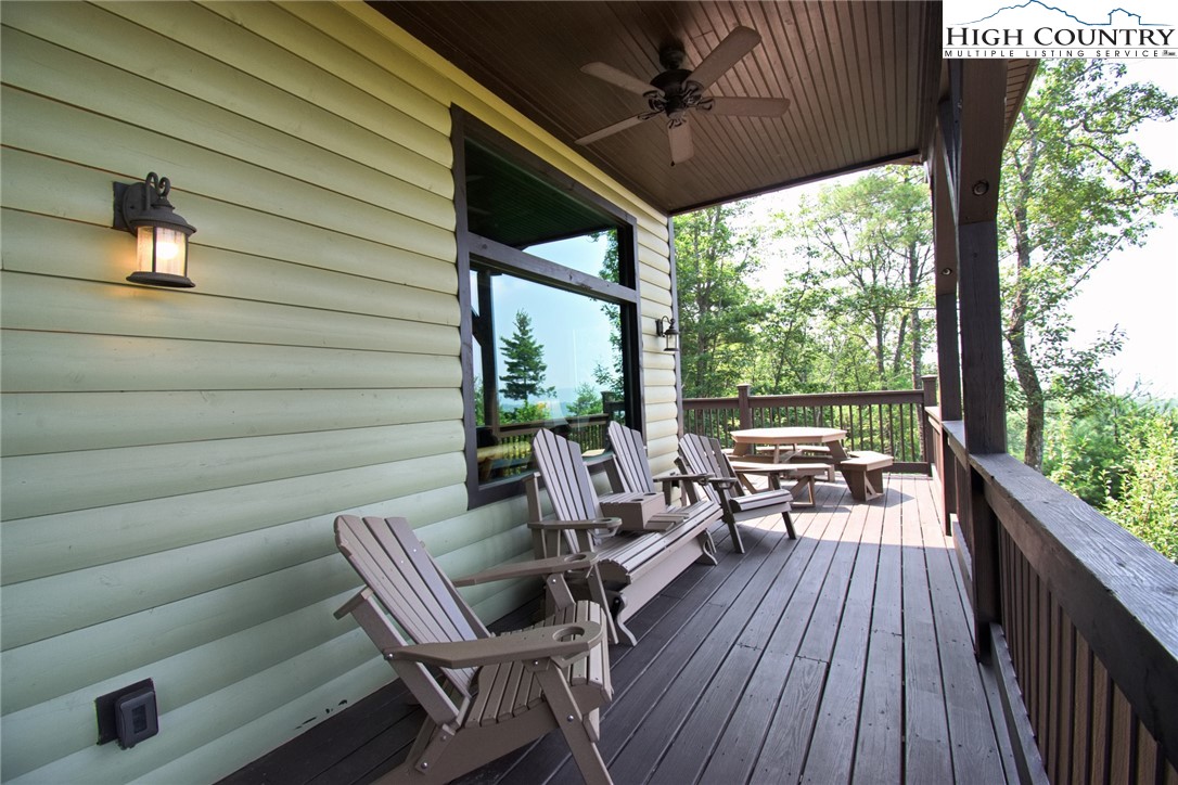 4879 Staghorn Road Purlear, NC 28665 - Photo 10 of 50 a view of a chairs in a balcony
