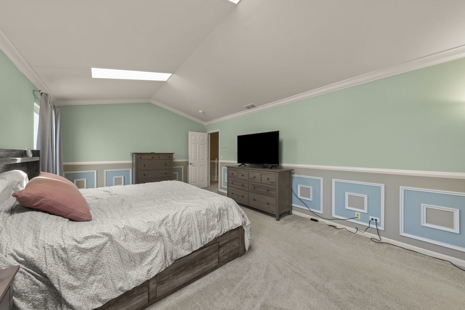 119 Reston Court Sycamore, IL 60178 - Photo 22 of 36 a bedroom with a bed and a flat screen tv