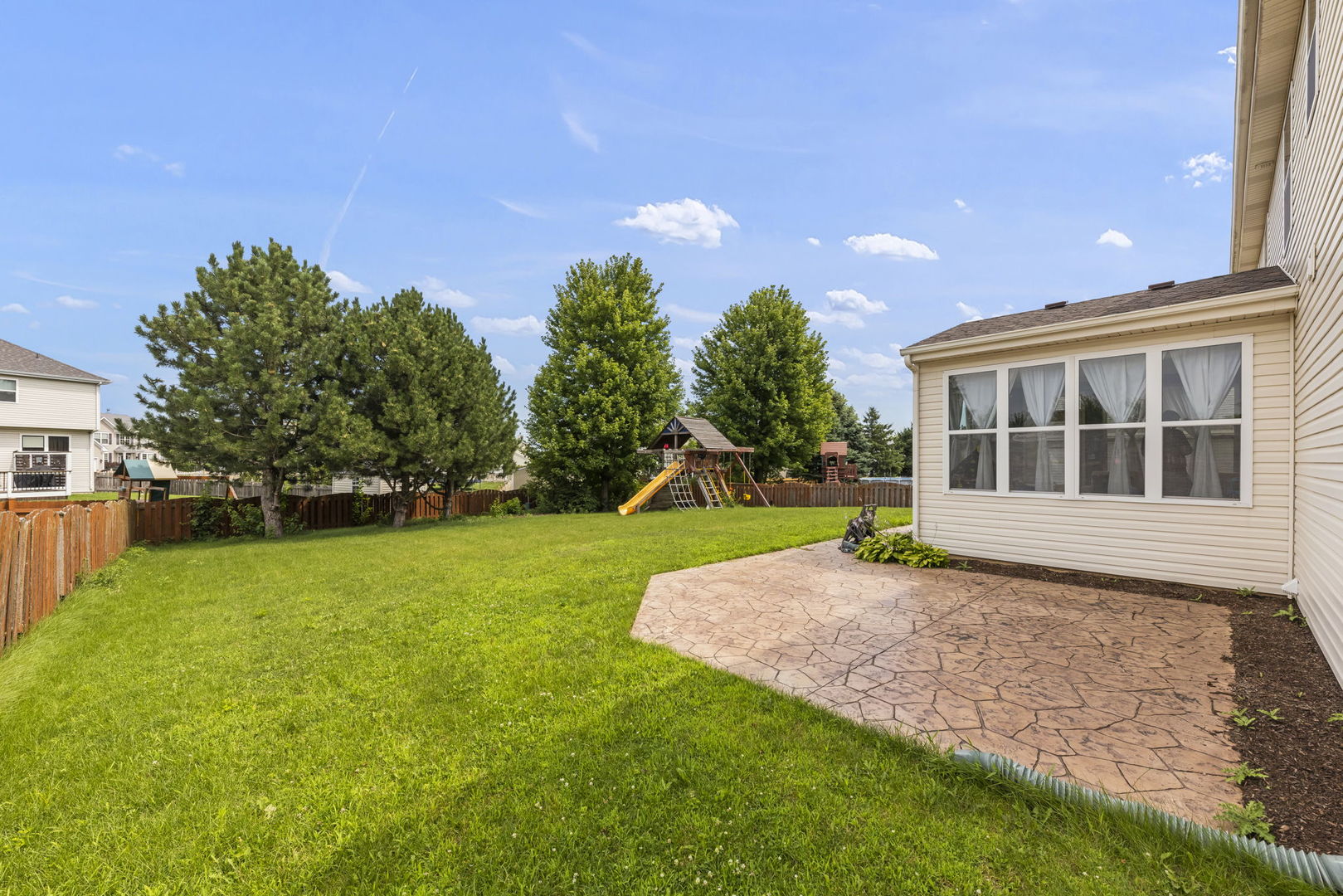 119 Reston Court Sycamore, IL 60178 - Photo 30 of 36 a house view with a garden space