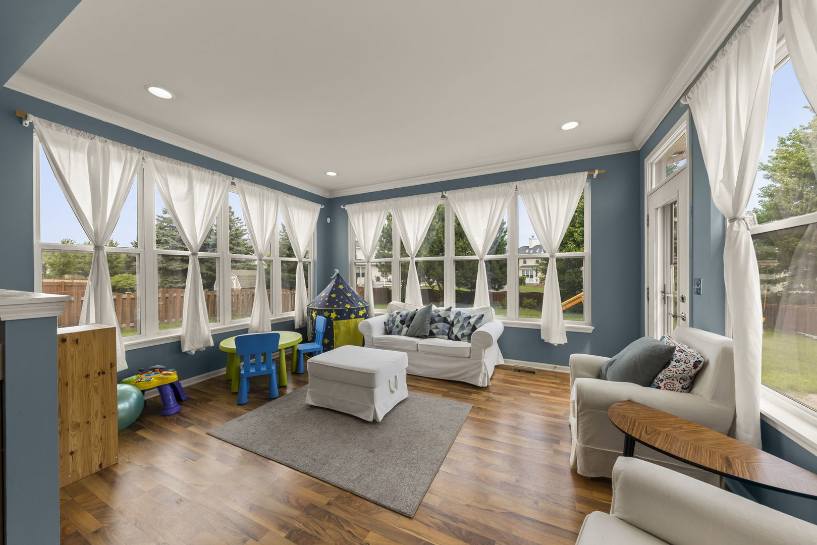 119 Reston Court Sycamore, IL 60178 - Photo 10 of 36 a living room with furniture and a large window