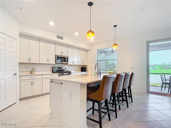 a kitchen that has a cabinets counter space and appliances