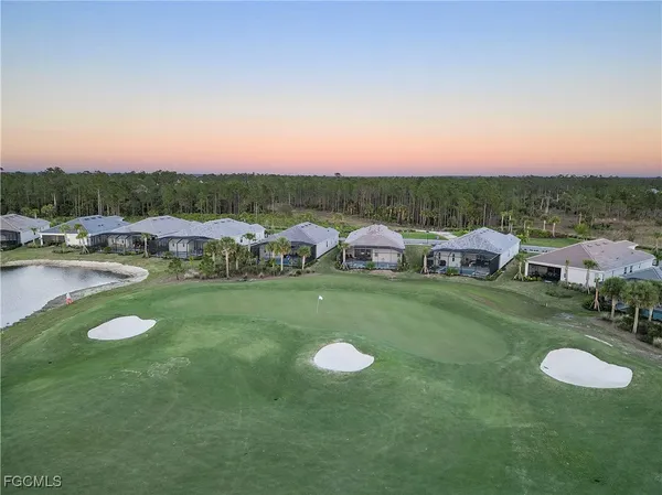a view of a garden with houses