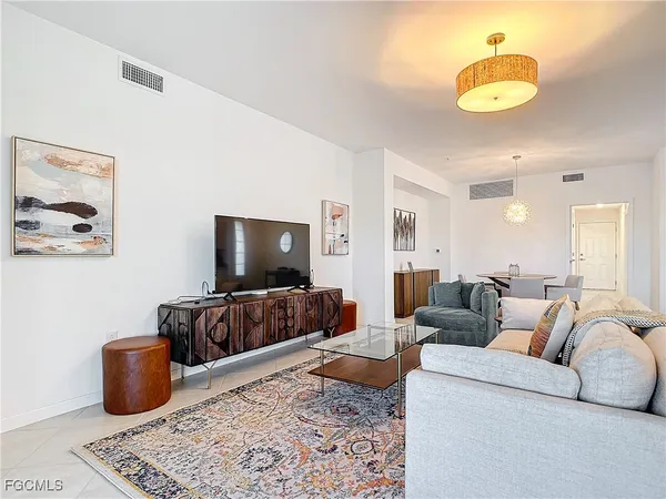 a living room with furniture and a couch