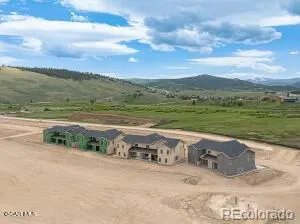 a view of a lake with a yard