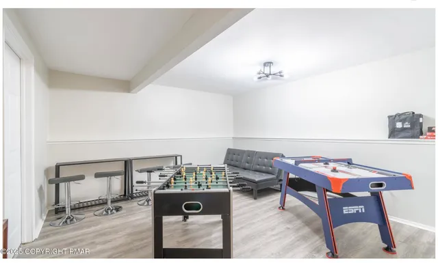 a living room with furniture and a table