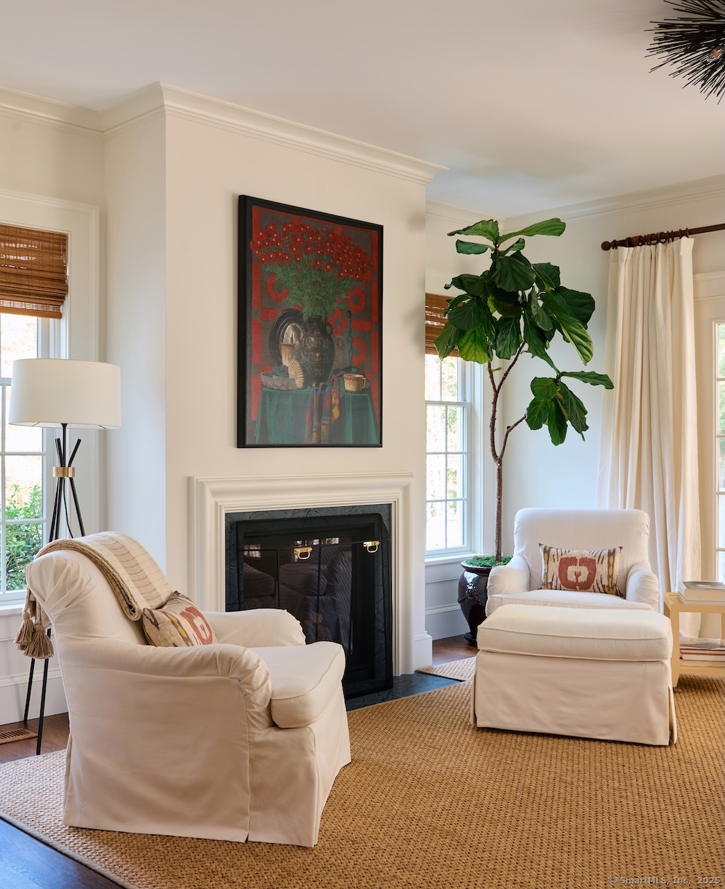 200 Sharon Mountain Road Sharon, CT 06069 - Photo 12 of 29 a living room with furniture a fireplace and a potted plant