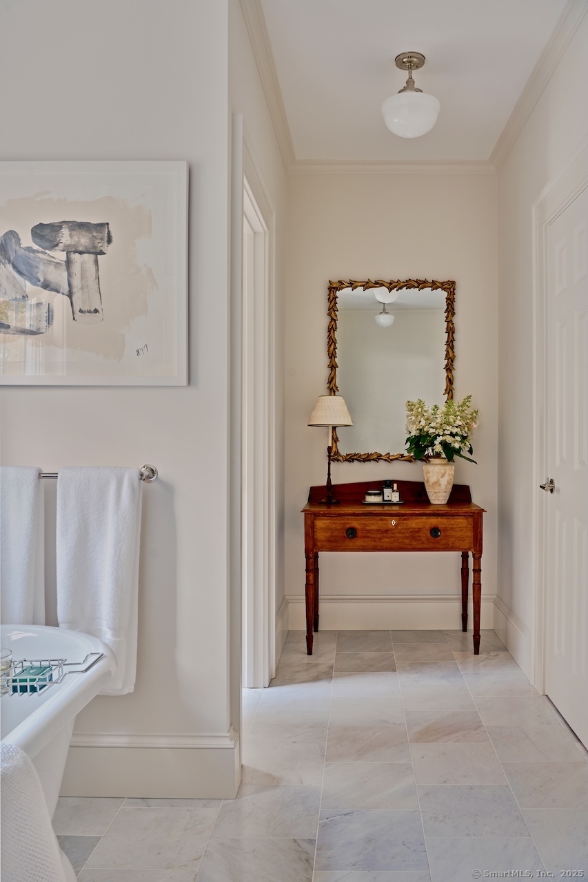 200 Sharon Mountain Road Sharon, CT 06069 - Photo 16 of 29 a living room with furniture and a table