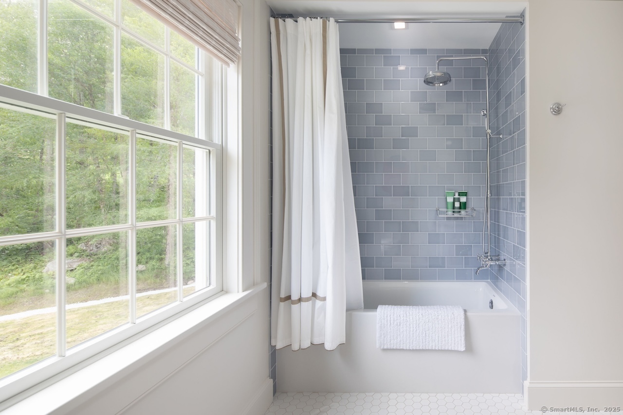 200 Sharon Mountain Road Sharon, CT 06069 - Photo 27 of 29 a bathroom with a shower and a bathtub