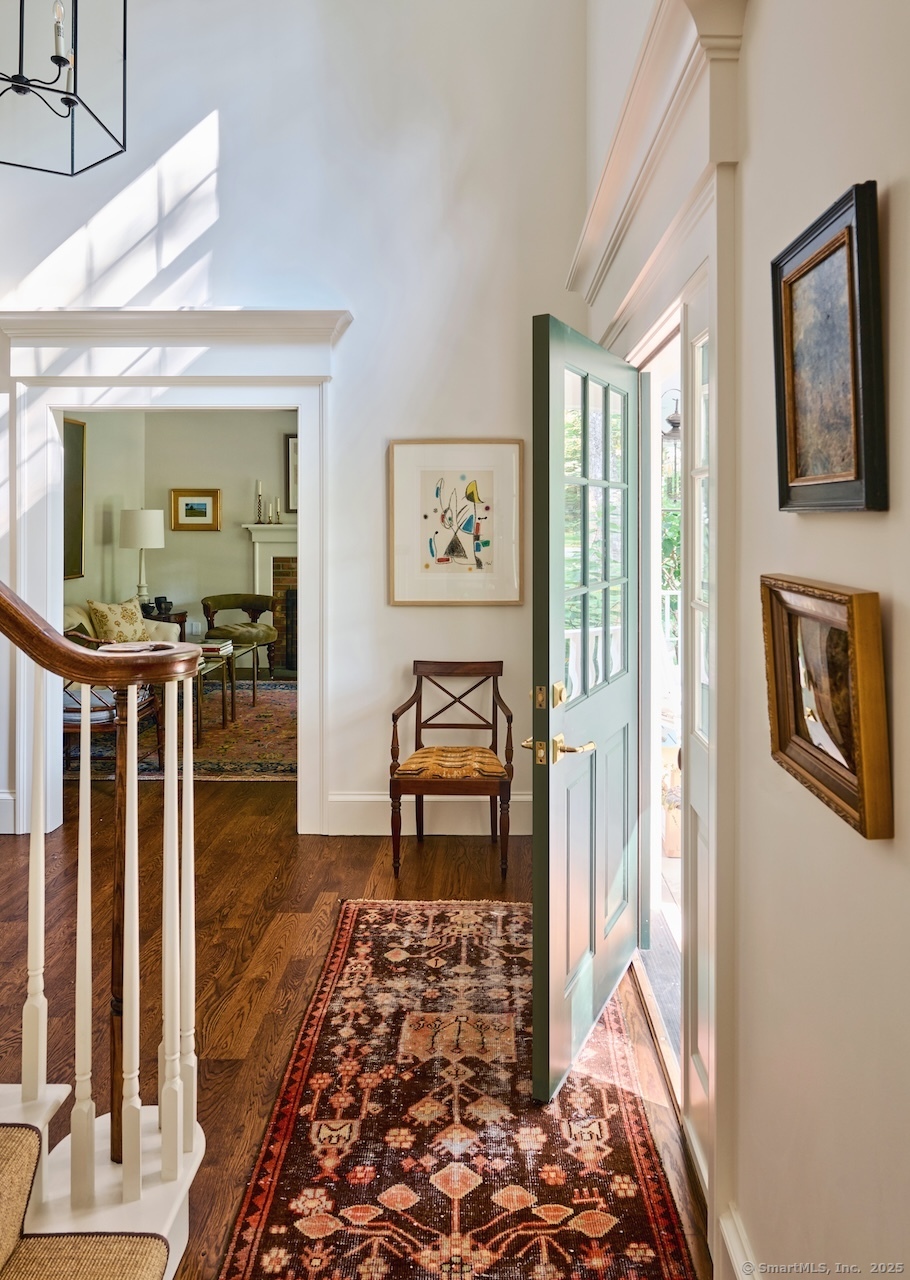 200 Sharon Mountain Road Sharon, CT 06069 - Photo 5 of 29 a view of a hallway with wooden floor and furniture