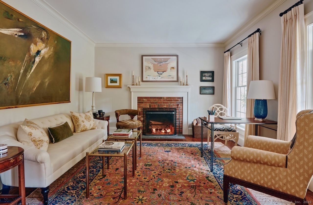 200 Sharon Mountain Road Sharon, CT 06069 - Photo 6 of 29 a living room with furniture a large window and a fireplace
