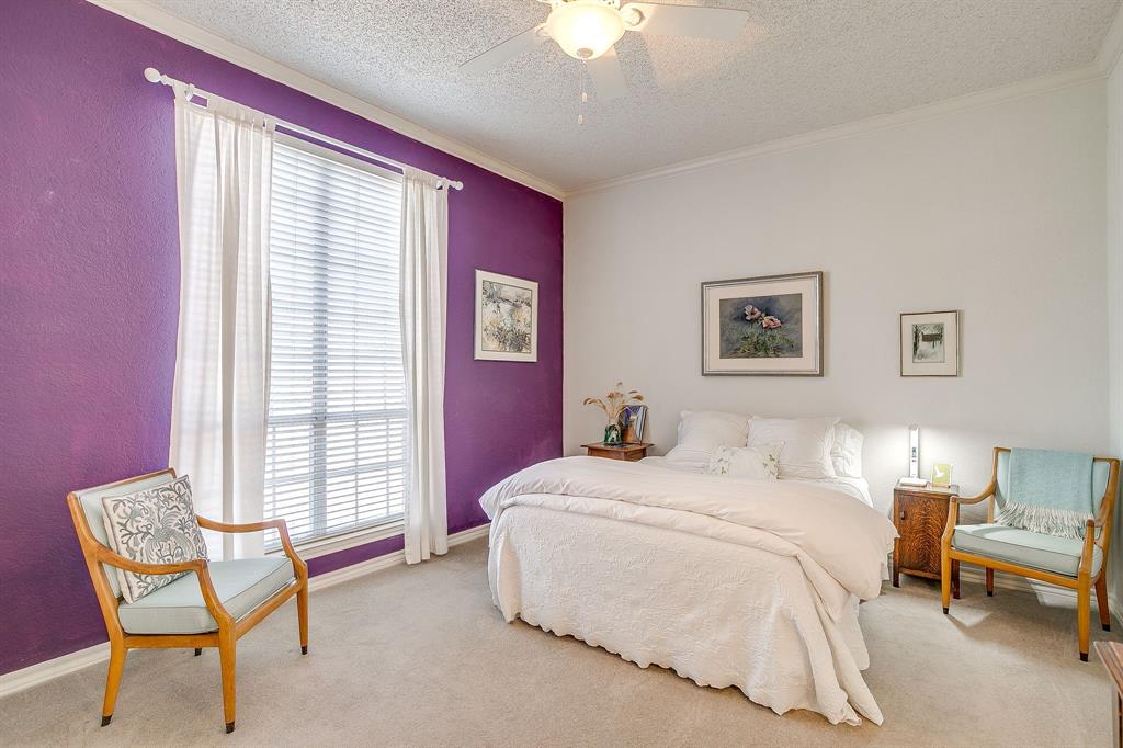 3913 Willow Way Road Fort Worth, TX 76133 - Photo 14 of 38 a bedroom with a bed chair and window