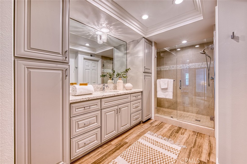 29276 Rue Cerise Laguna Niguel, CA 92677 - Photo 15 of 22 Beautifully updated bath with step-in shower and two closets; one a walk-in closet.