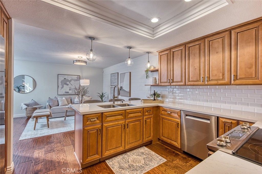 29276 Rue Cerise Laguna Niguel, CA 92677 - Photo 9 of 22 The kitchen is open to a separate family room