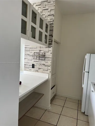 a view of kitchen with washer and dryer