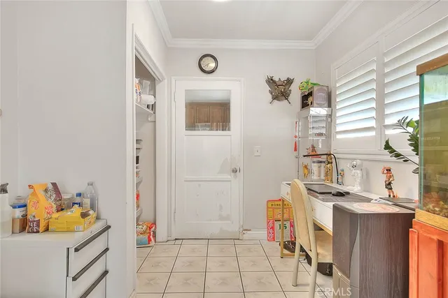 a view of storage and utility room with a sink