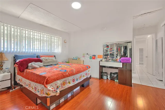 a bed room with a bed and a table