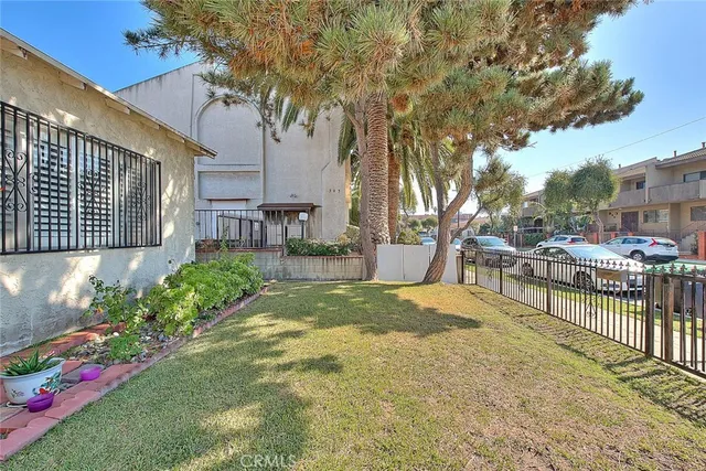 a view of a backyard with a garden