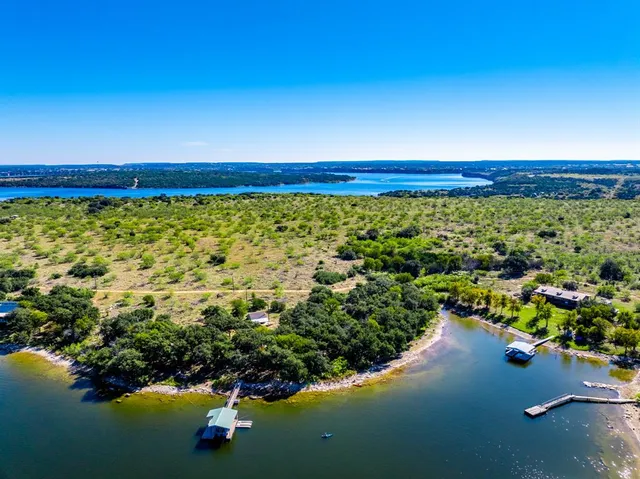 a view of a lake with a city