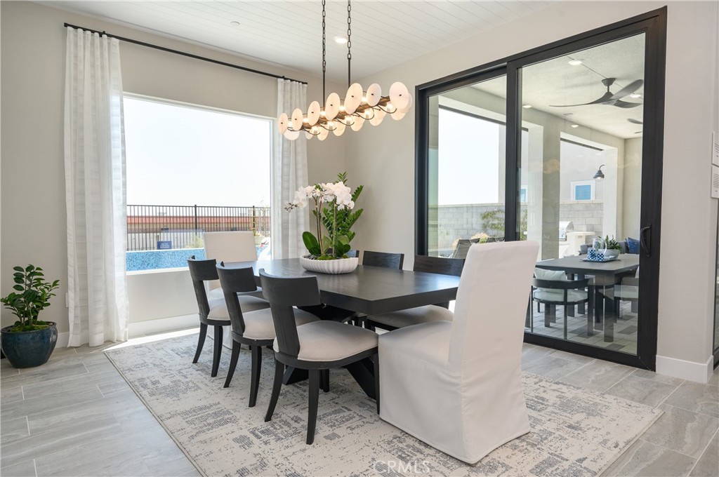 13093 Edgware Drive Rancho Cucamonga, CA 91739 - Photo 7 of 25 a view of a dining room with furniture window and outside view