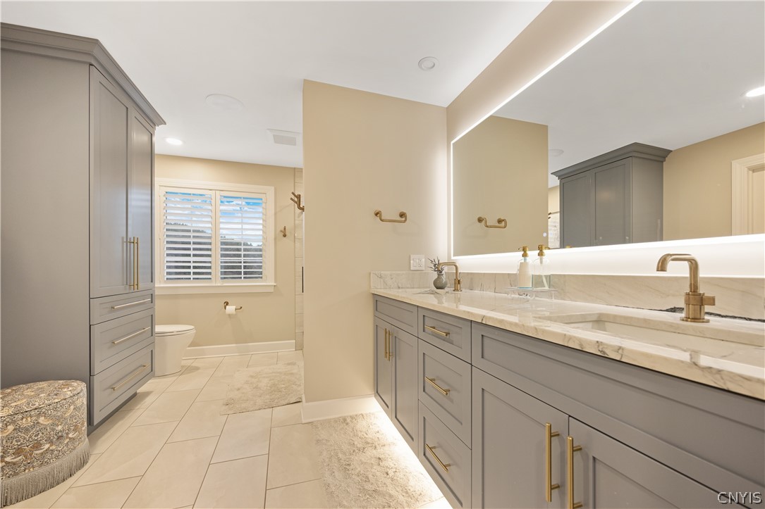 6198 Rossiter Road DeWitt, NY 13078 - Photo 23 of 39 Owners bath, double vanity, custom lighting and mi