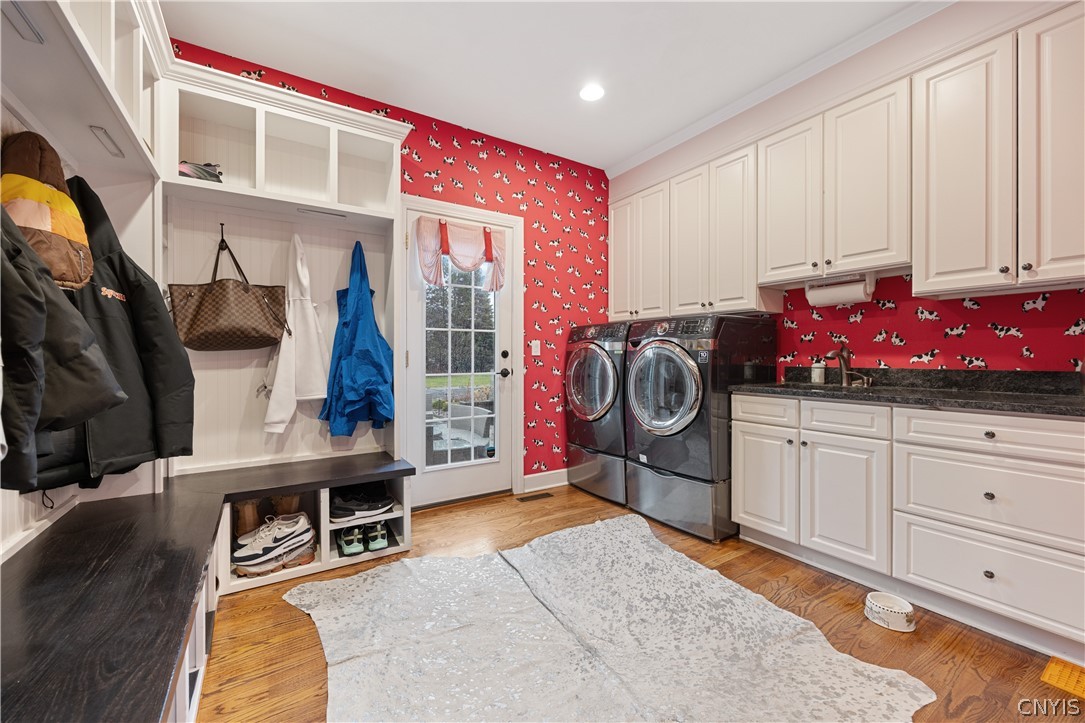 6198 Rossiter Road De Witt, NY 13078 - Photo 38 of 50 Mud room off garage with laundry. Loads of cubbie