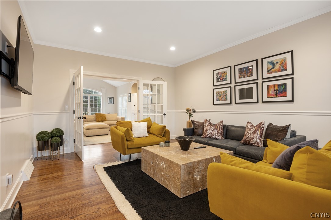 6198 Rossiter Road DeWitt, NY 13078 - Photo 6 of 39 Front living space with double glass doors.