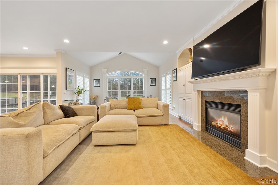 6198 Rossiter Road DeWitt, NY 13078 - Photo 8 of 39 Open family room space with loads of windows!