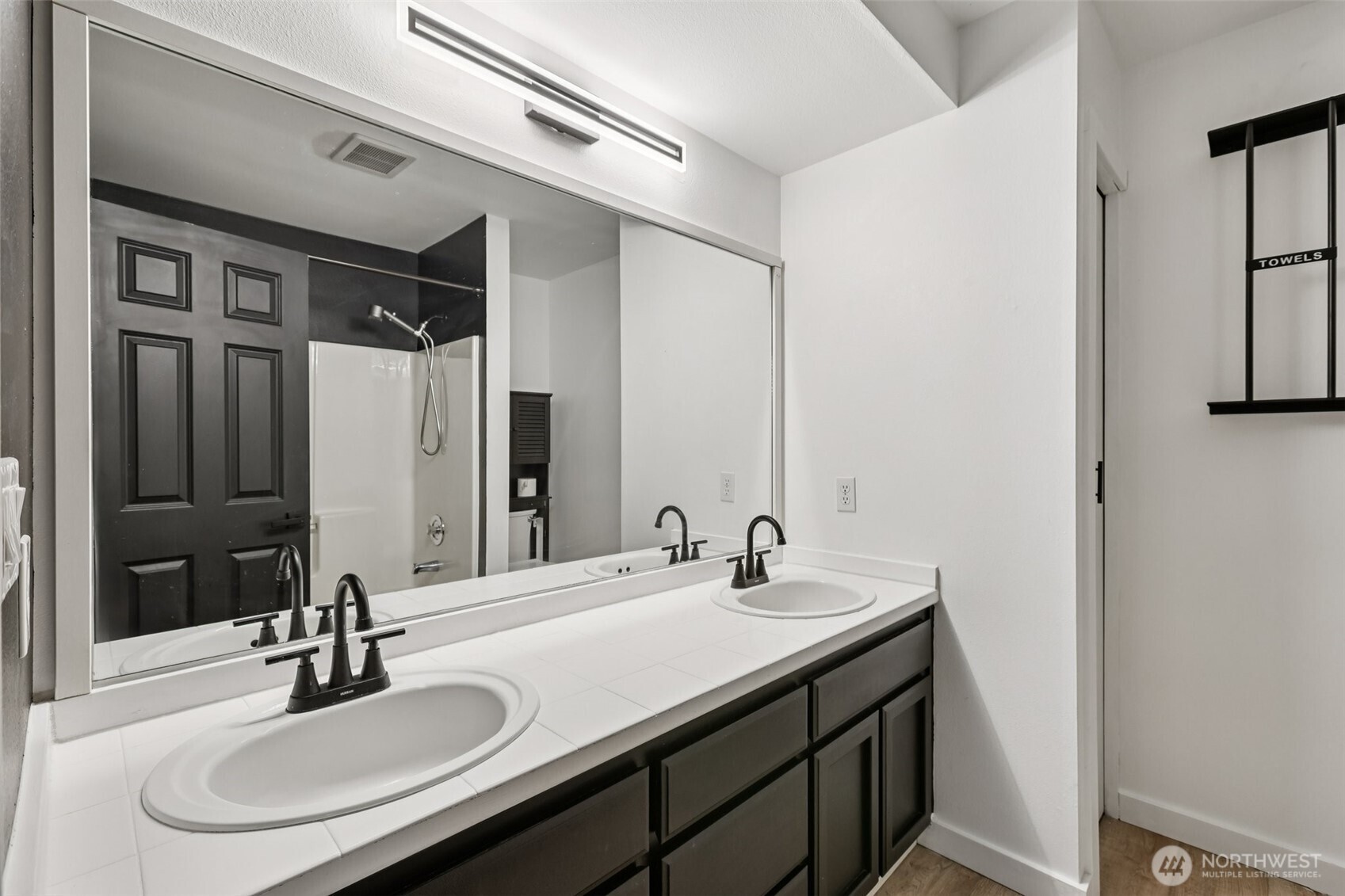 2210 Grade Road, Unit 7 Lake Stevens, WA 98258 - Photo 14 of 27 a bathroom with a sink and a mirror