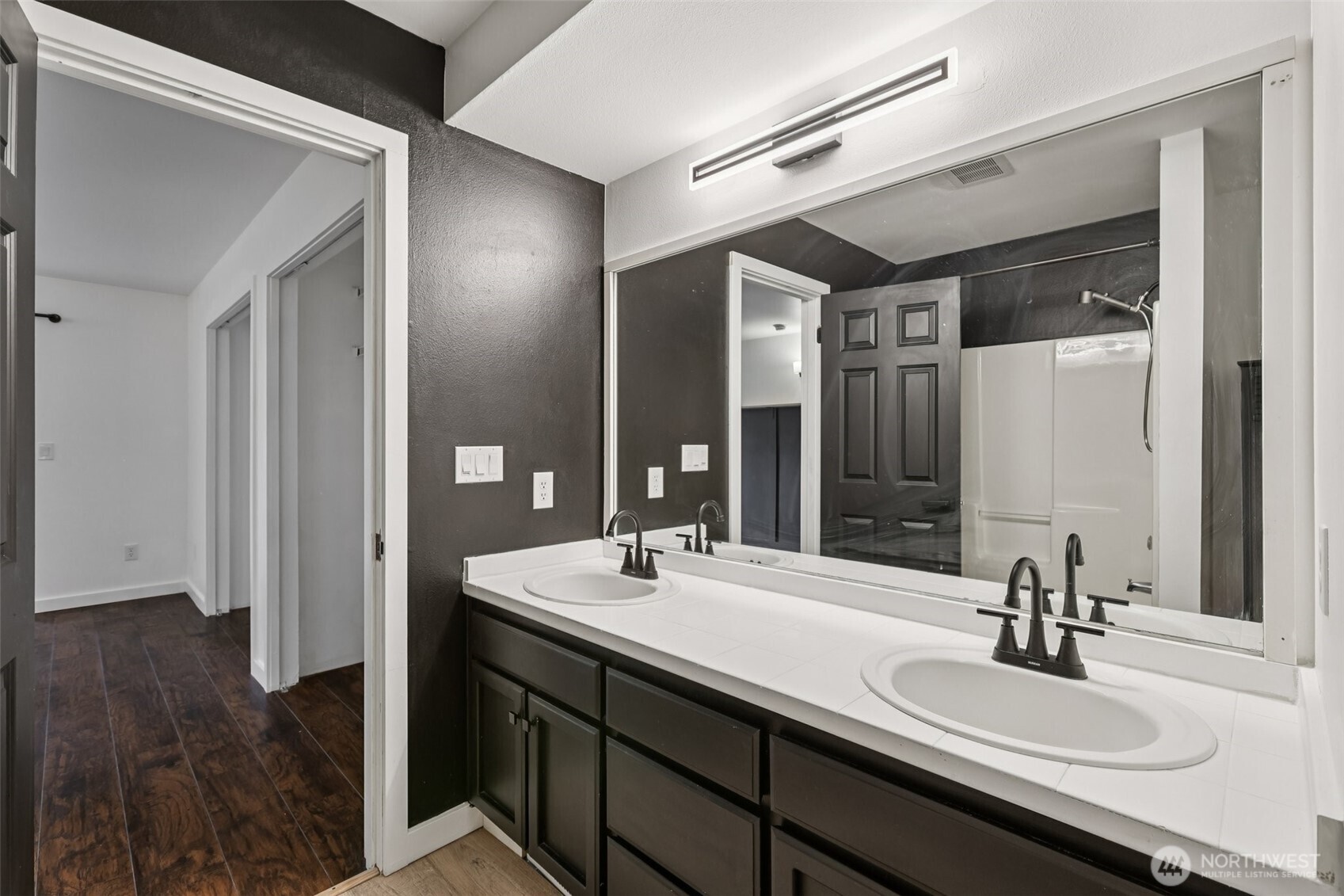 2210 Grade Road, Unit 7 Lake Stevens, WA 98258 - Photo 15 of 27 a bathroom with a double vanity sink and a mirror