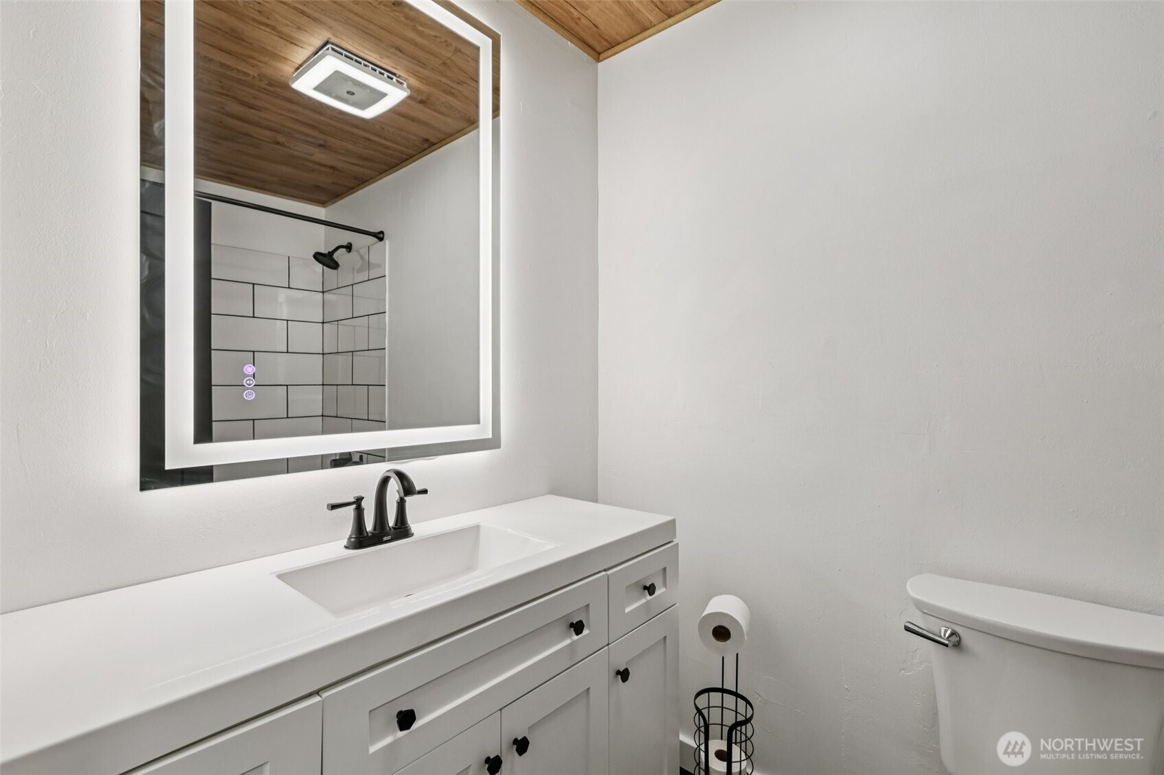 2210 Grade Road, Unit 7 Lake Stevens, WA 98258 - Photo 18 of 27 a bathroom with a sink and a mirror