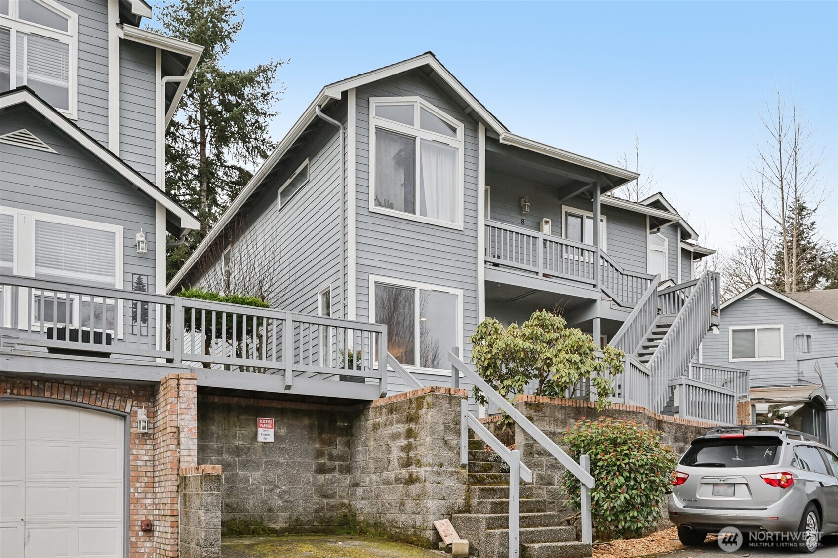 2210 Grade Road, Unit 7 Lake Stevens, WA 98258 - Photo 3 of 27 a view of a house with wooden deck front of house