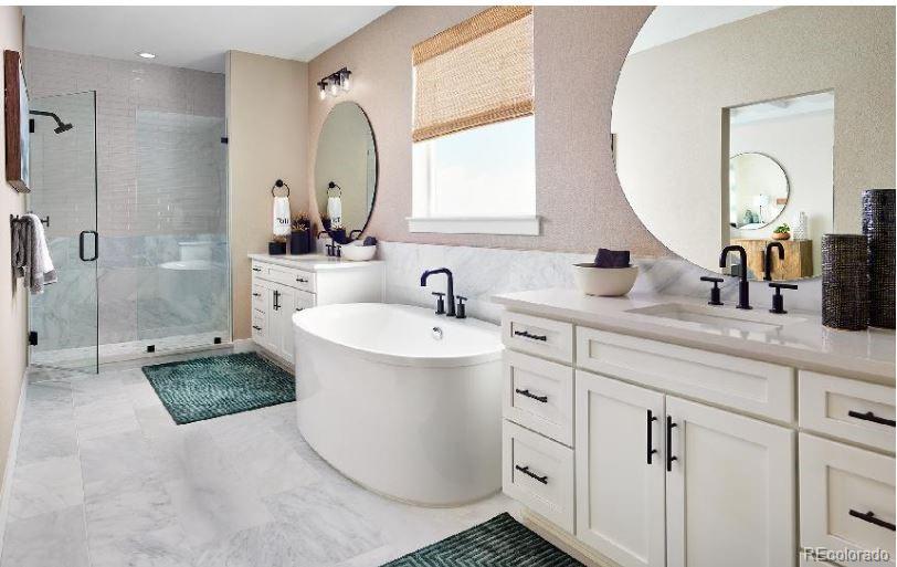 3 Simmental Loop Castle Rock, CO 80104 - Photo 10 of 22 a bathroom with a double vanity sink mirror double vanity