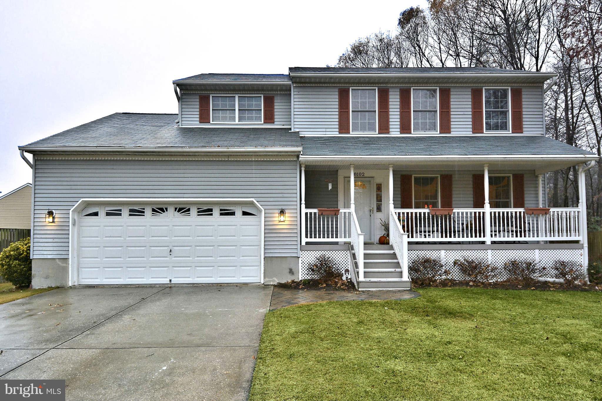 8102 Walton Road Severn, MD 21144 - Photo 2 of 30 a front view of a house with a garden