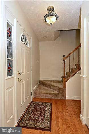 8102 Walton Road Severn, MD 21144 - Photo 3 of 30 a view of an entryway with wooden floor
