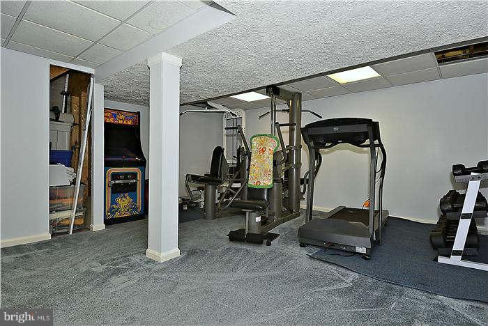 8102 Walton Road Severn, MD 21144 - Photo 28 of 30 a view of a room with gym equipment