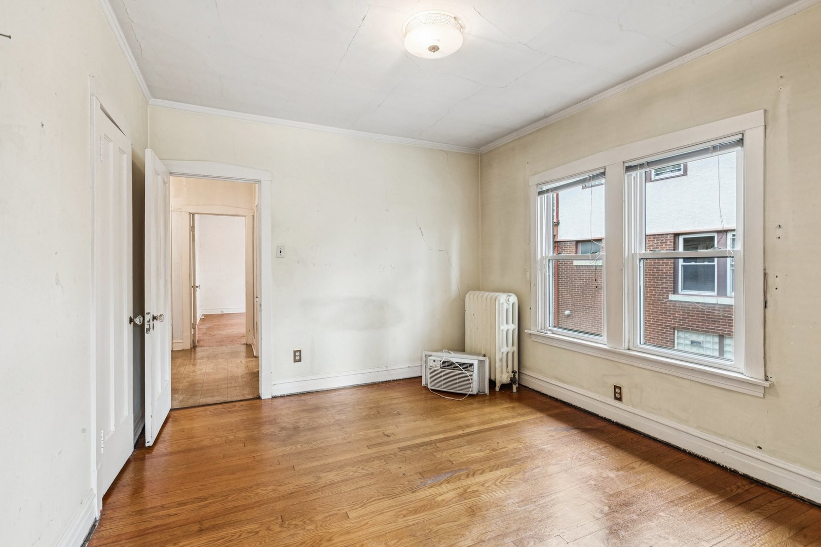 327 Keystone Avenue River Forest, IL 60305 - Photo 18 of 38 a view of empty room with wooden floor and fan