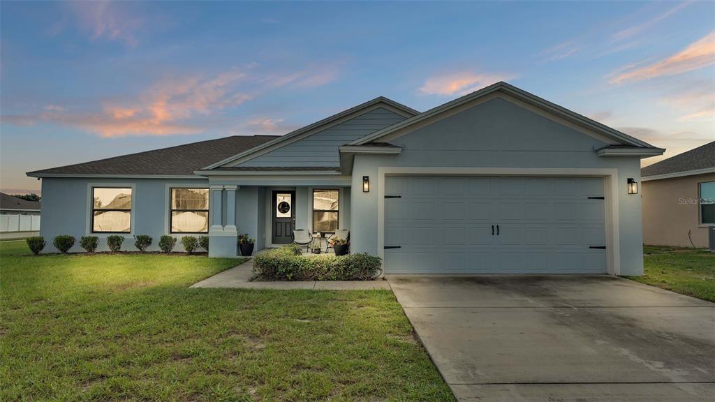 2375 Twin Lake View Road Winter Haven, FL 33881 - Photo 1 of 1 a view of a house with a yard