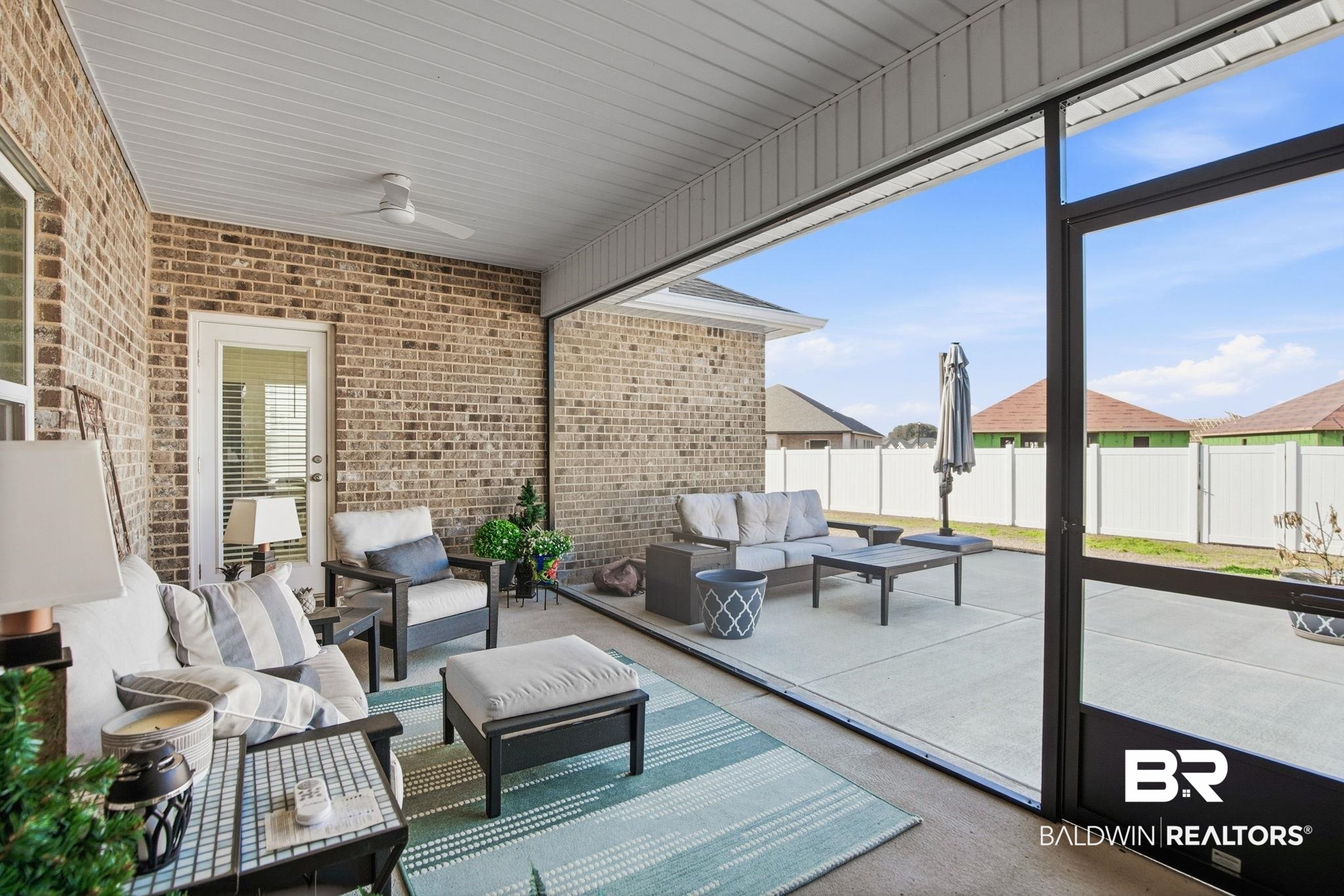 11123 Genuine Risk Circle Daphne, AL 36526 - Photo 54 of 67 Sunroom with a ceiling fan, an outdoor lounge area, and a patio area