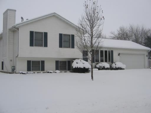 316 Errett Road Hillcrest, IL 61068 - Photo 1 of 1 a front view of a house with yard and garage