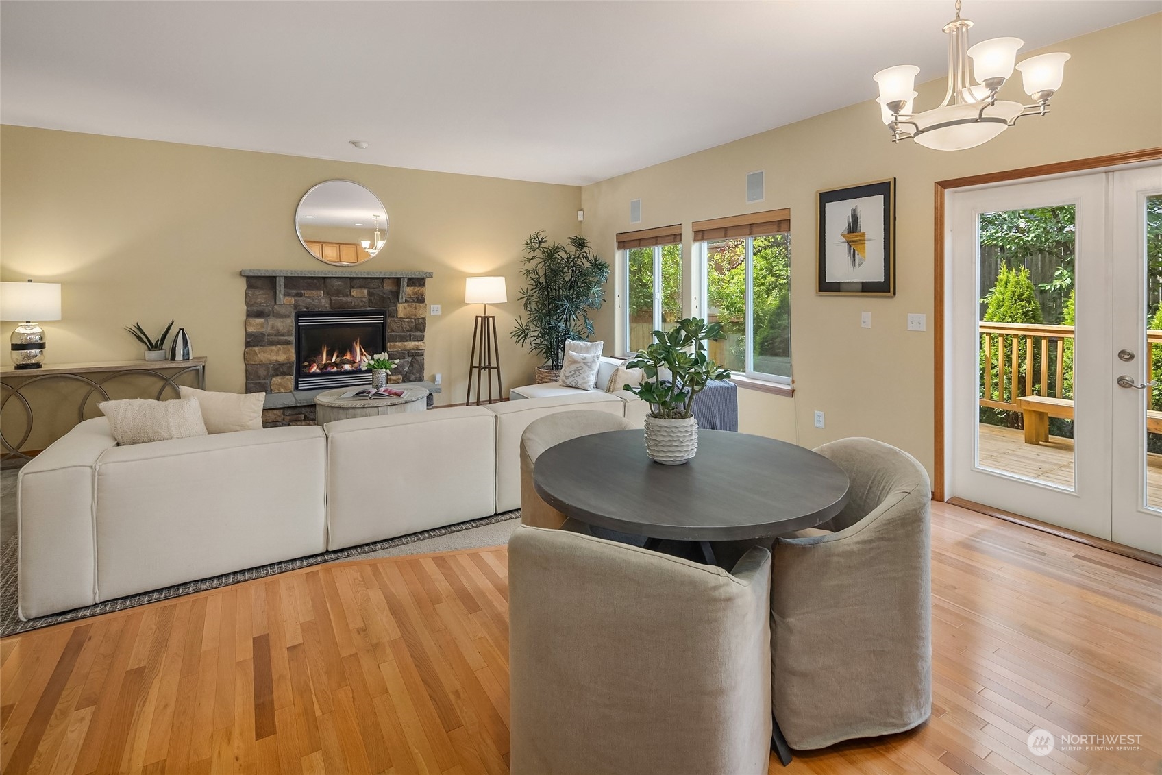 307 197th Place Southwest Bothell, WA 98012 - Photo 15 of 30 a living room with fireplace furniture and a large window