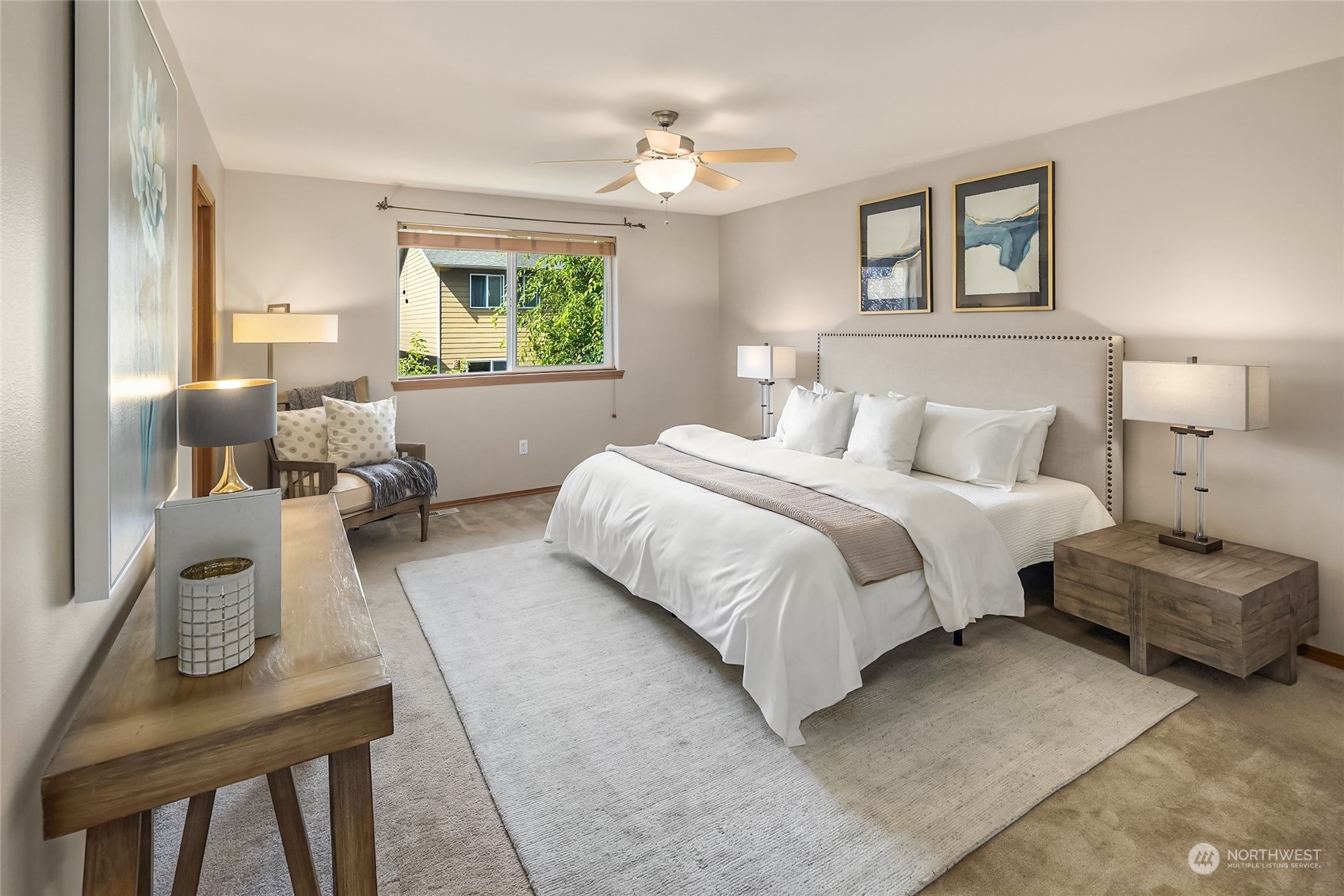 307 197th Place Southwest Bothell, WA 98012 - Photo 20 of 30 a bedroom with a bed and wooden floor