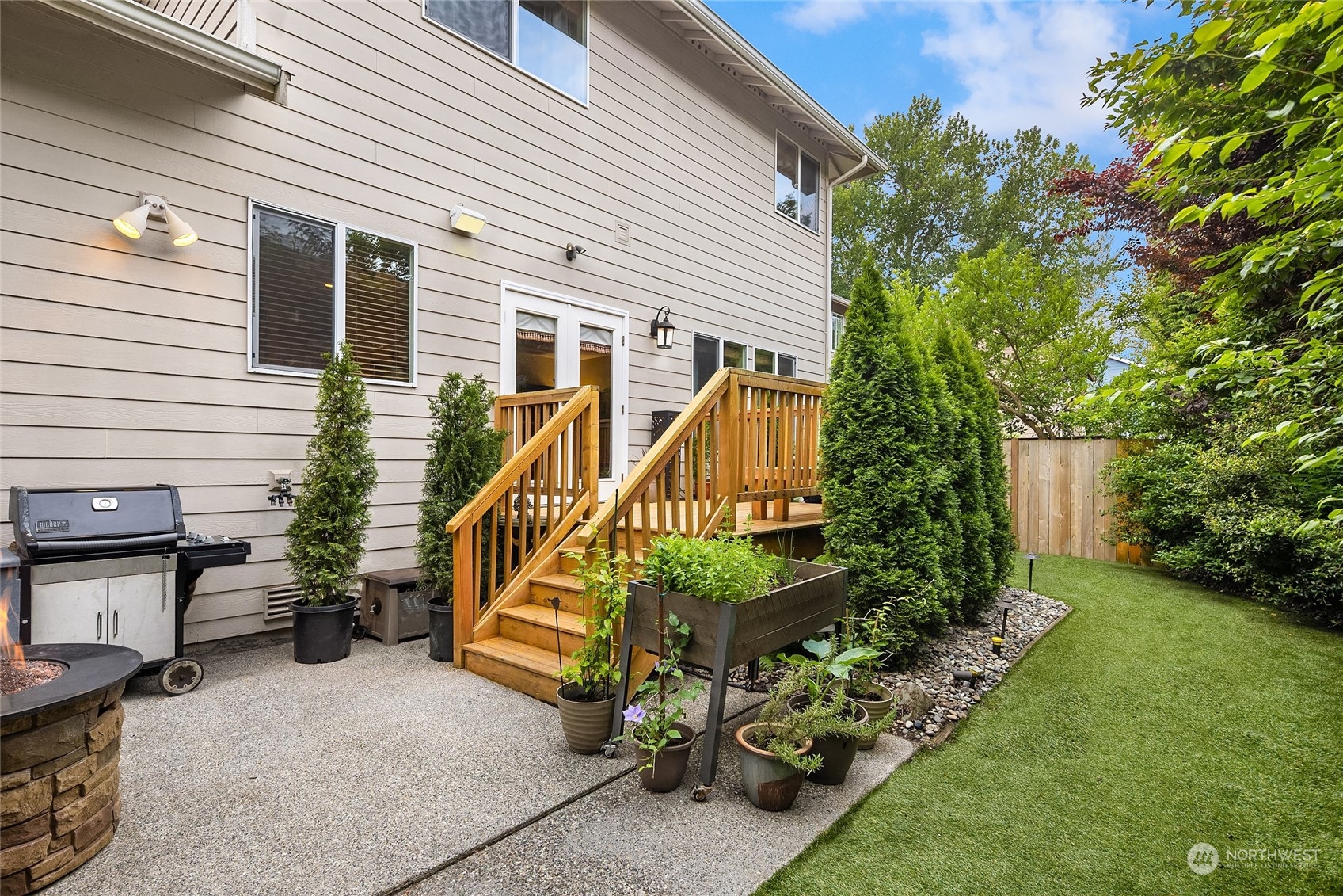 307 197th Place Southwest Bothell, WA 98012 - Photo 27 of 30 a view of a house with backyard and sitting area