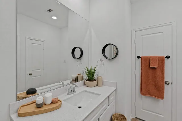 a view of an empty room and a window