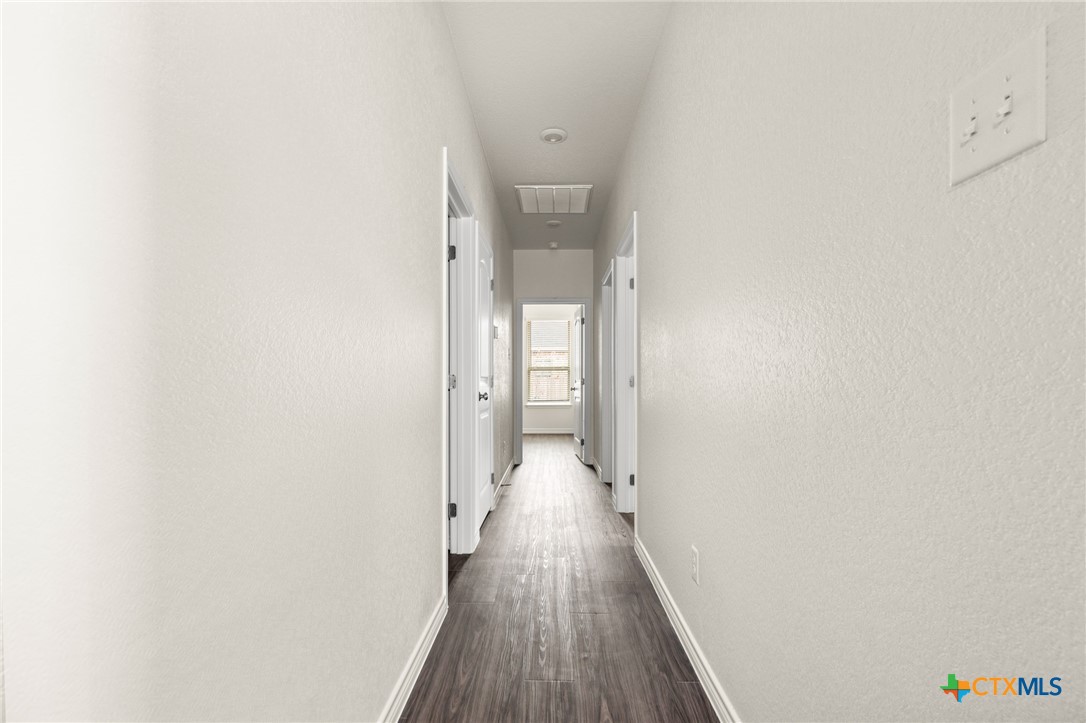 5219 Rose Gdn Loop Killeen, TX 76542 - Photo 10 of 19 a view of a room with wooden floor