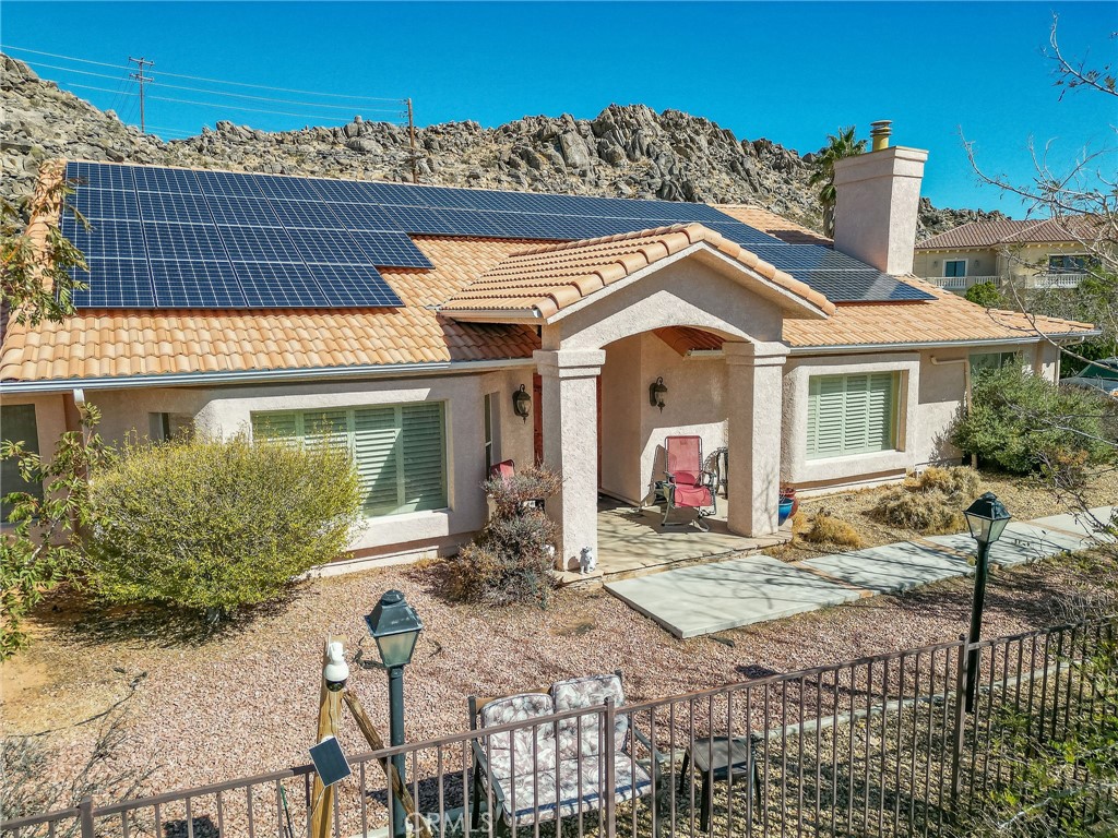 20430 Rancherias Road Apple Valley, CA 92307 - Photo 1 of 48 a view of a house with a patio