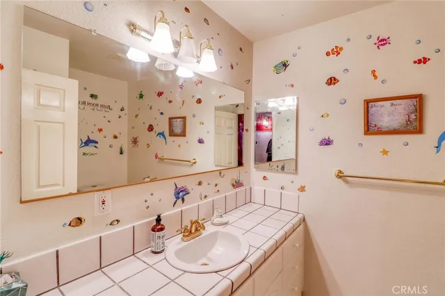 a bathroom with a tub and shower