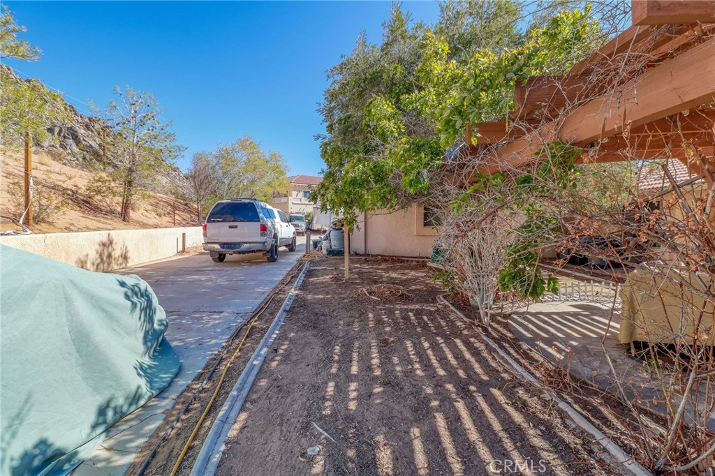 20430 Rancherias Road Apple Valley, CA 92307 - Photo 42 of 48 a house view with a outdoor space