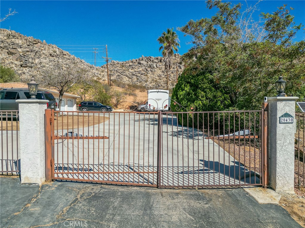 20430 Rancherias Road Apple Valley, CA 92307 - Photo 44 of 48 a view of a gate with a street view